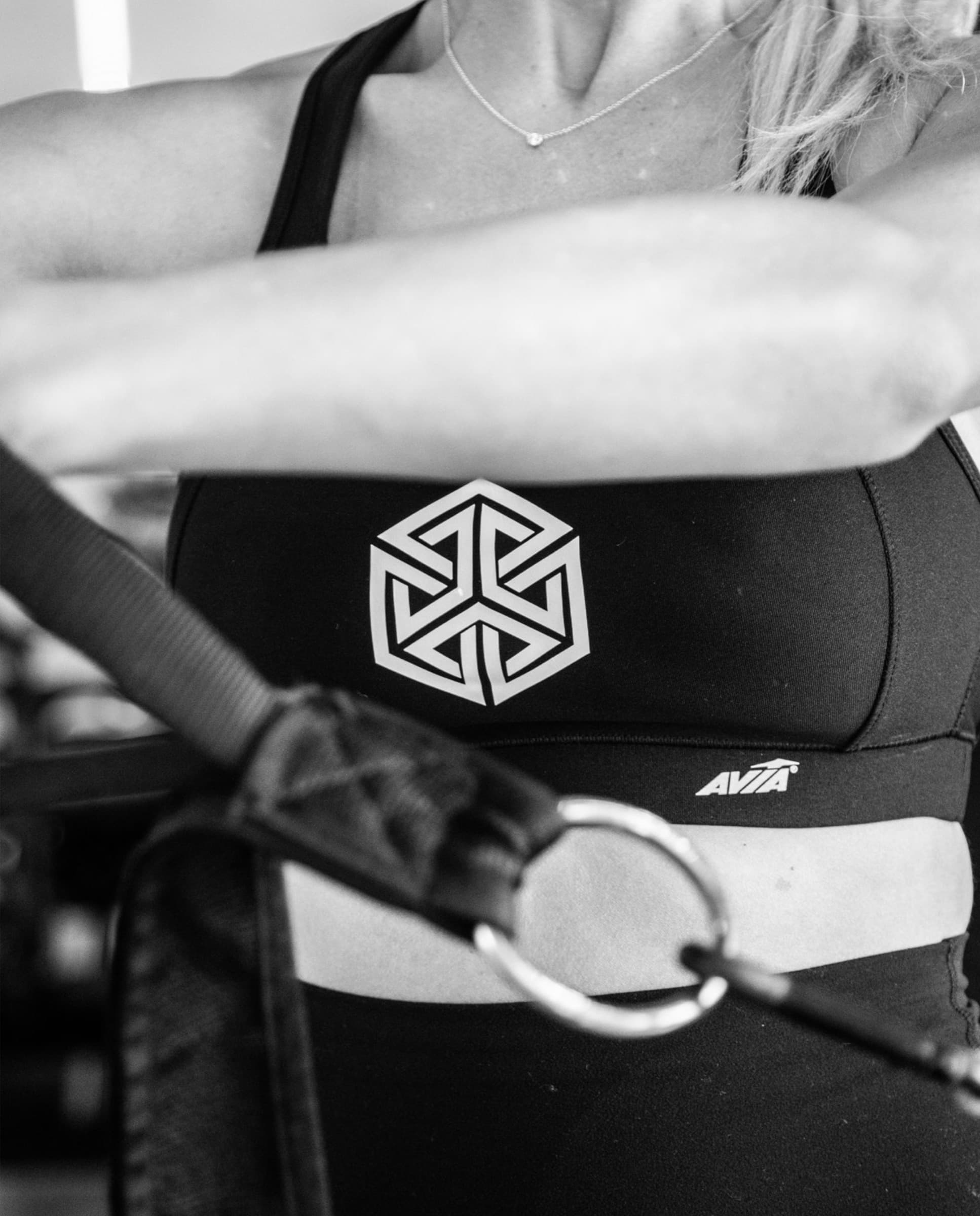 Person exercising on Club Lagree equipment