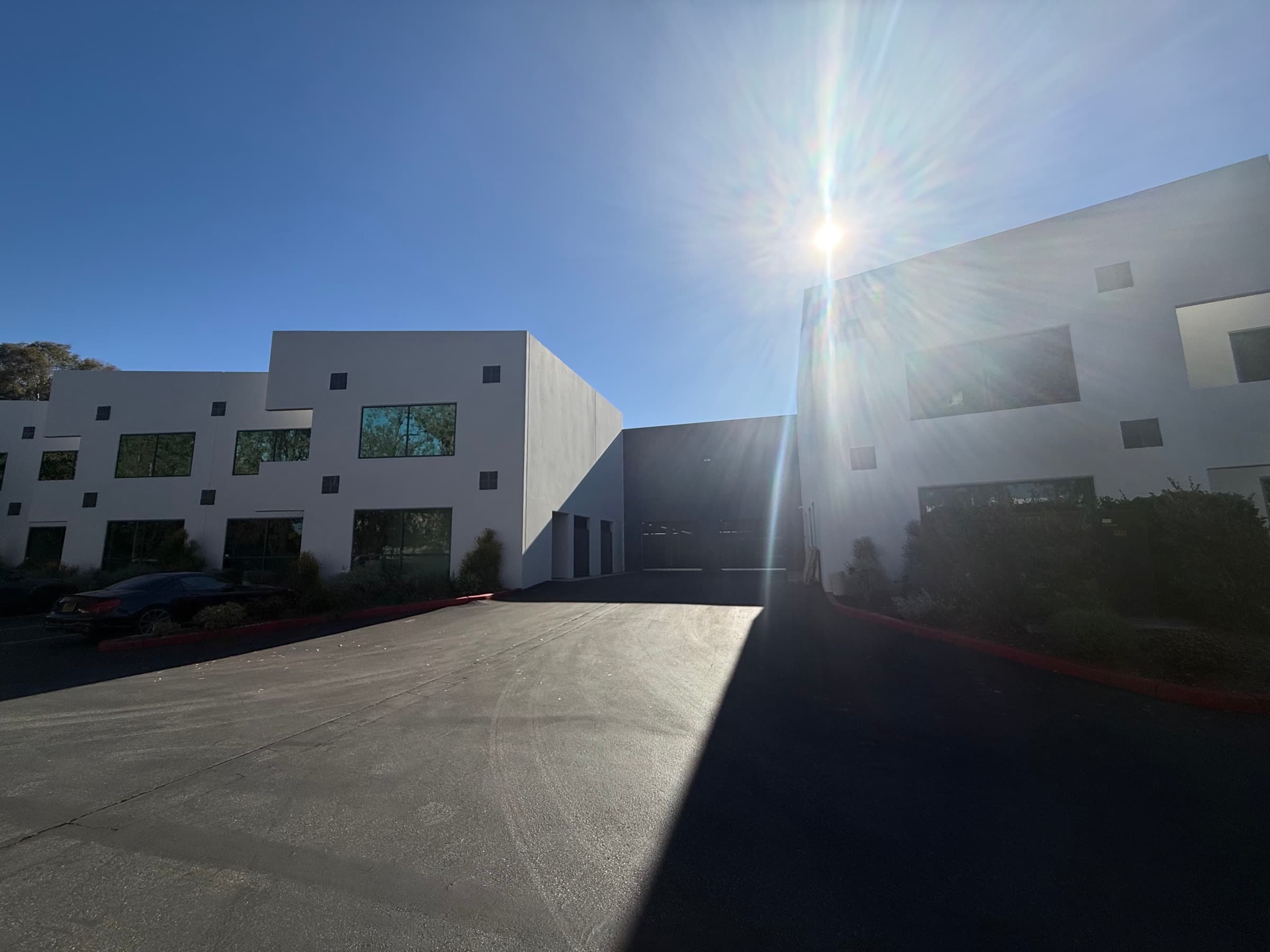 Exterior of 2475 Townsgate Road under a clear Westlake Village sky