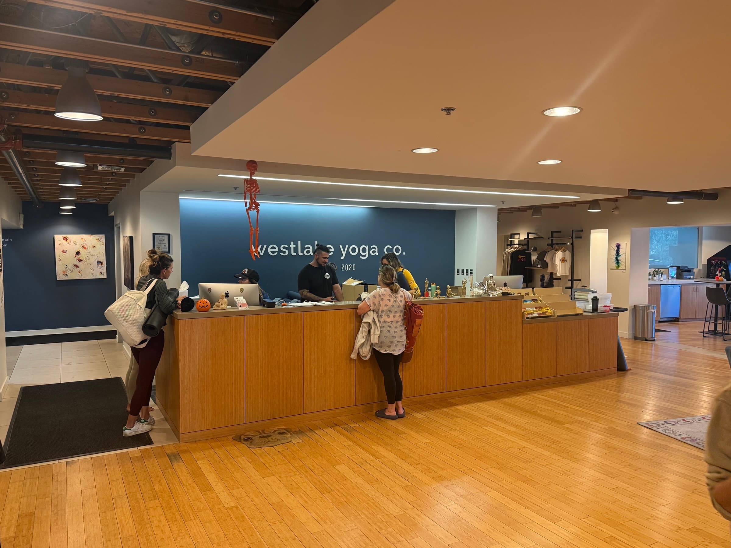 Westlake Yoga Co. reception desk and logo wall